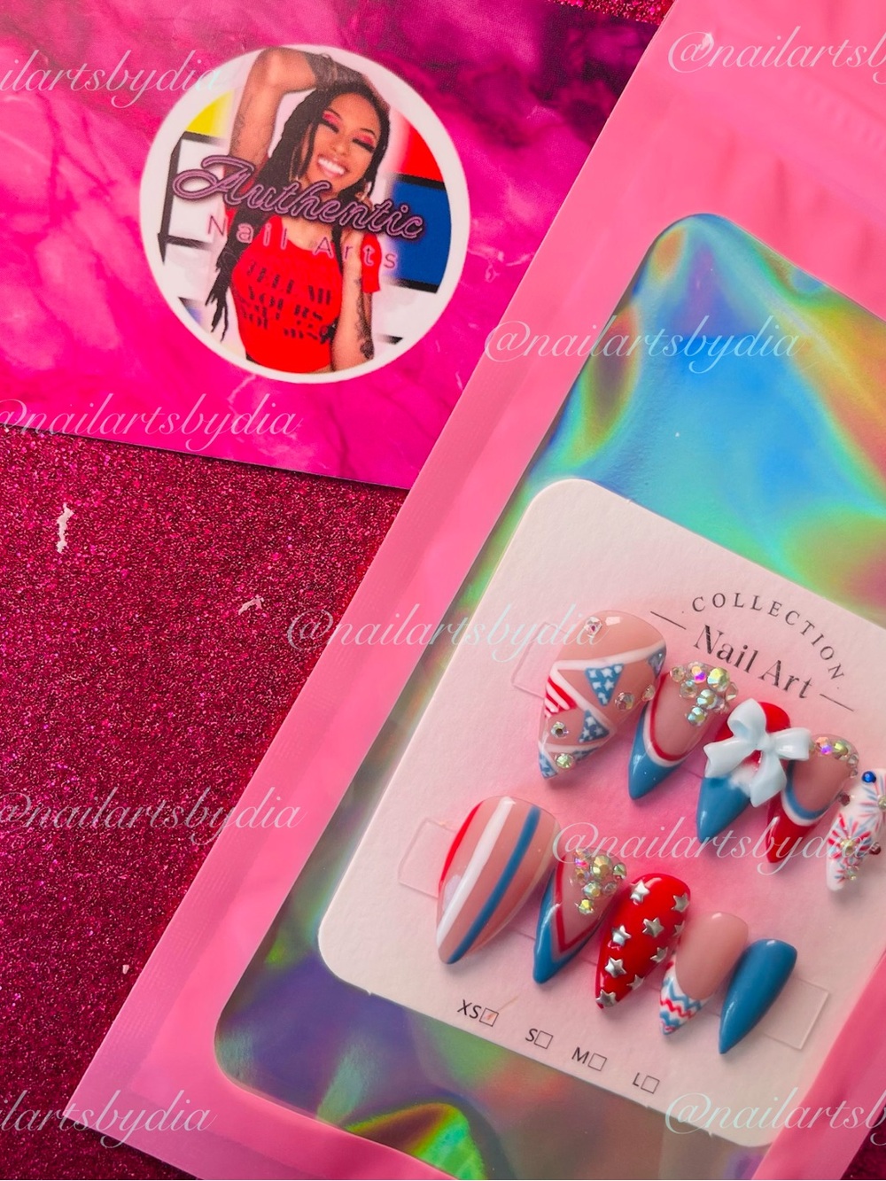 Stunning red, white & blue stiletto nails with rhinestones and bows